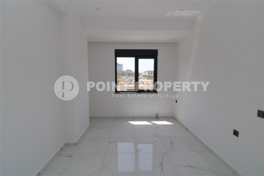 Spacious new apartment in vibrant Mahmutlar!-id-8220-photo-7