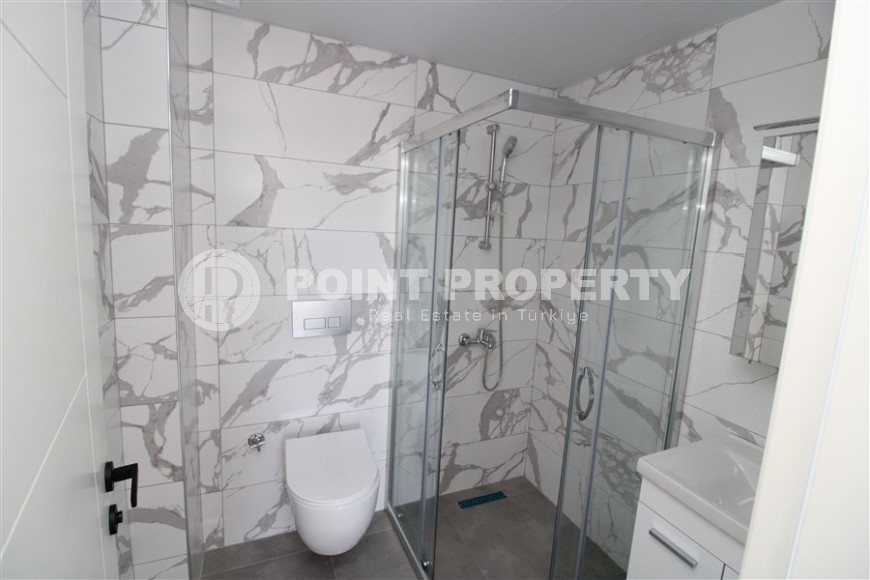 Spacious new apartment in vibrant Mahmutlar!-id-8220-photo-9