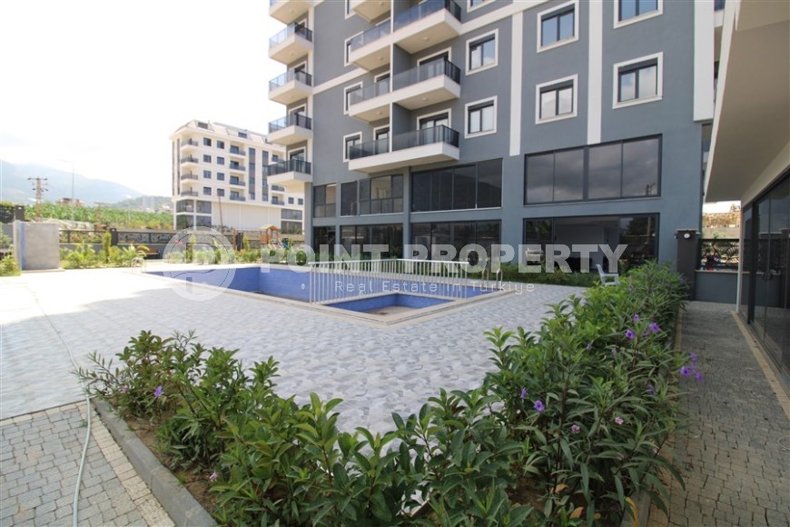 Spacious new apartment in vibrant Mahmutlar!-id-8220-photo-20