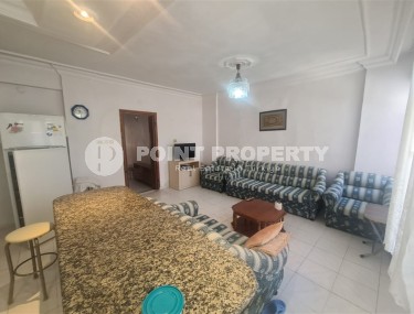 Доступная по цене квартира в 90 кв.м в самом центре Махмутлара!-id-8221-фото-2