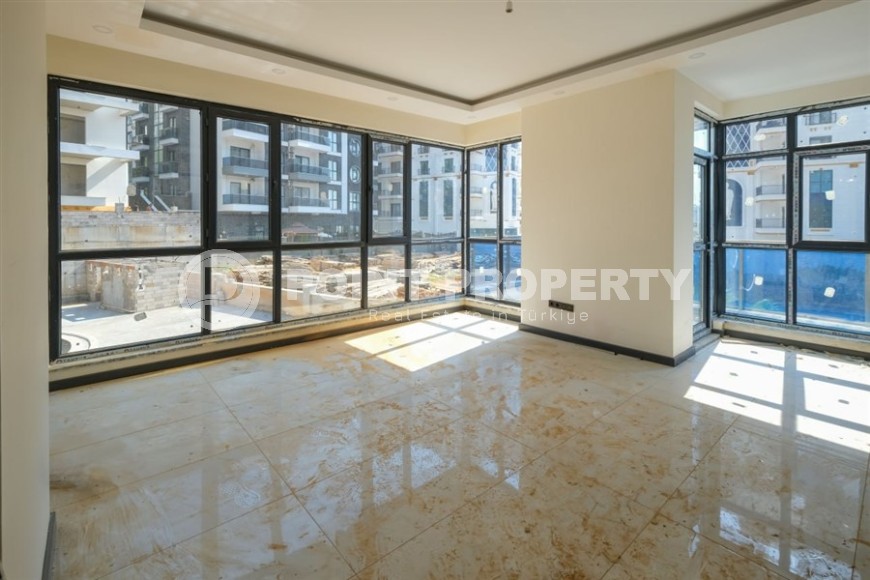 Apartments in a residential complex at the final stage of construction, 3+1 layout, in the Mahmutlar area-id-5413-photo-1