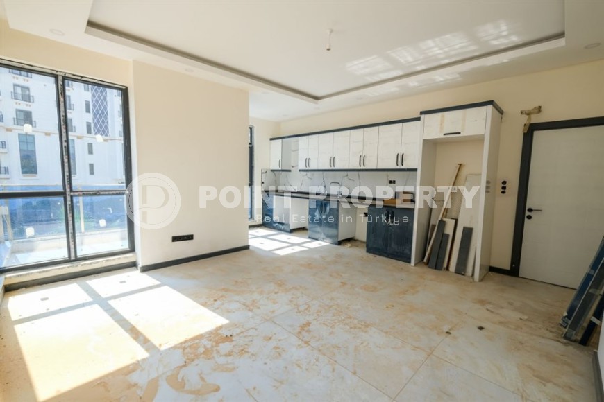 Апартаменты в жилом комплексе на завершающем этапе строительства, планировкой 3+1, в районе Махмутлар-id-5413-фото-3