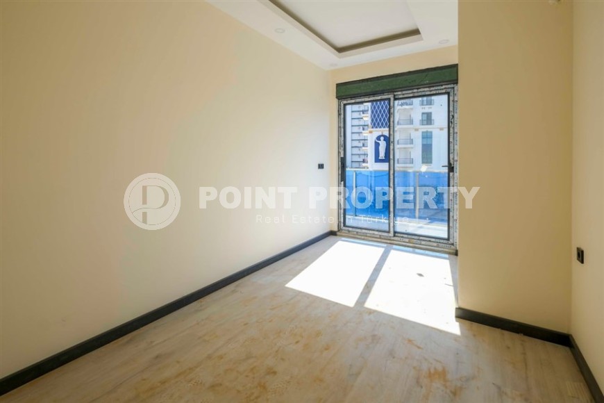 Апартаменты в жилом комплексе на завершающем этапе строительства, планировкой 3+1, в районе Махмутлар-id-5413-фото-6