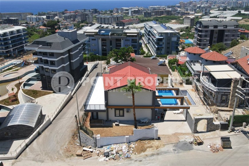 Роскошная вилла-дуплекс с террасой в живописном районе Каргыджак!-id-8239-фото-12