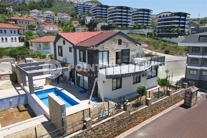 Роскошная вилла-дуплекс с террасой в живописном районе Каргыджак!-id-8239-фото-19