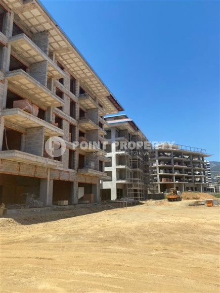 Просторная двухкомнатная квартира на завершающем этапе строительтсва, 75 м2, в элитном районе Кестель, Алания, 200 метров до моря-id-1646-фото-9