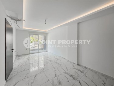 Новая квартира вблизи от моря в районе Махмутлар!-id-8248-фото-2