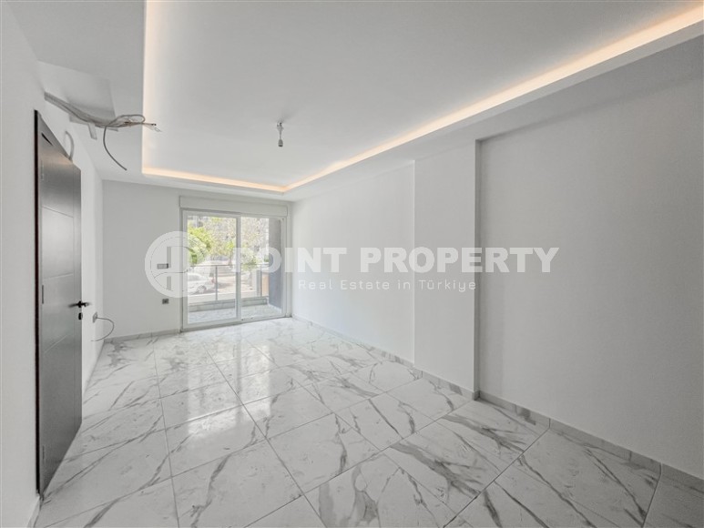 Новая квартира вблизи от моря в районе Махмутлар!-id-8248-фото-2