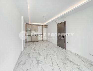 Новая квартира вблизи от моря в районе Махмутлар!-id-8248-фото-3