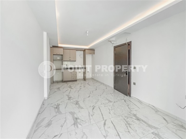 Новая квартира вблизи от моря в районе Махмутлар!-id-8248-фото-3