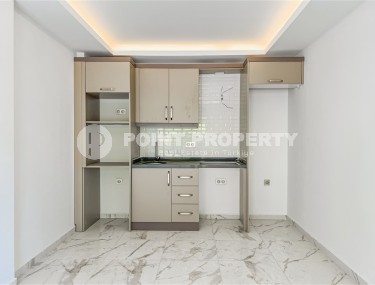 Новая квартира вблизи от моря в районе Махмутлар!-id-8248-фото-4