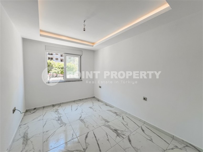 Новая квартира вблизи от моря в районе Махмутлар!-id-8248-фото-6