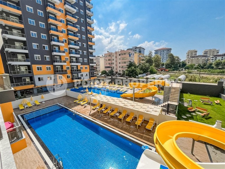 Новая квартира вблизи от моря в районе Махмутлар!-id-8248-фото-17