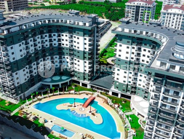 Stylish 1+1 apartment, 55m², overlooking the Taurus Mountains in a new luxury complex in Mahmutlar, Alanya-id-1649-photo-1