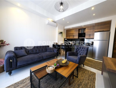 Stylish 1+1 apartment, 55m², overlooking the Taurus Mountains in a new luxury complex in Mahmutlar, Alanya-id-1649-photo-2