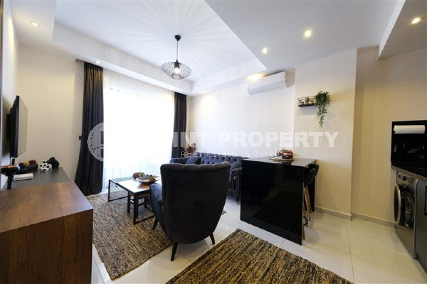 Стильная квартира 1+1, 55м², с видом на горы Торос в новом элитном комплексе в Махмутларе, Алания-id-1649-фото-3