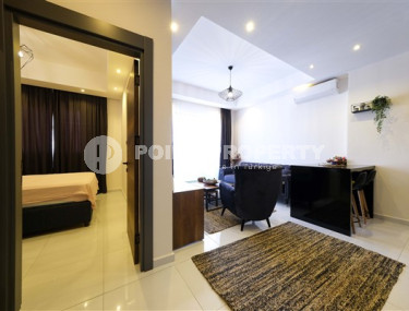 Stylish 1+1 apartment, 55m², overlooking the Taurus Mountains in a new luxury complex in Mahmutlar, Alanya-id-1649-photo-4