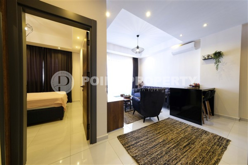 Стильная квартира 1+1, 55м², с видом на горы Торос в новом элитном комплексе в Махмутларе, Алания-id-1649-фото-4