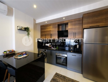 Stylish 1+1 apartment, 55m², overlooking the Taurus Mountains in a new luxury complex in Mahmutlar, Alanya-id-1649-photo-5