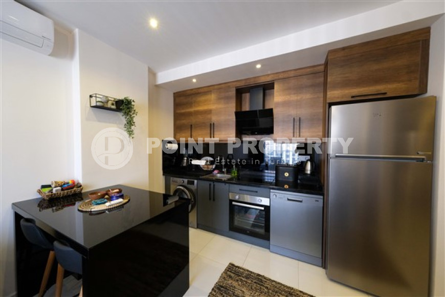 Стильная квартира 1+1, 55м², с видом на горы Торос в новом элитном комплексе в Махмутларе, Алания-id-1649-фото-5