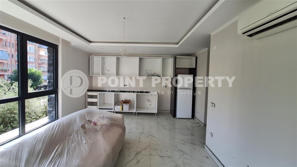 Двухкомнатные квартиры и квартиры-студии, 32-65м², в новом проекте с бассейном в центре Алании-id-2284-фото-2