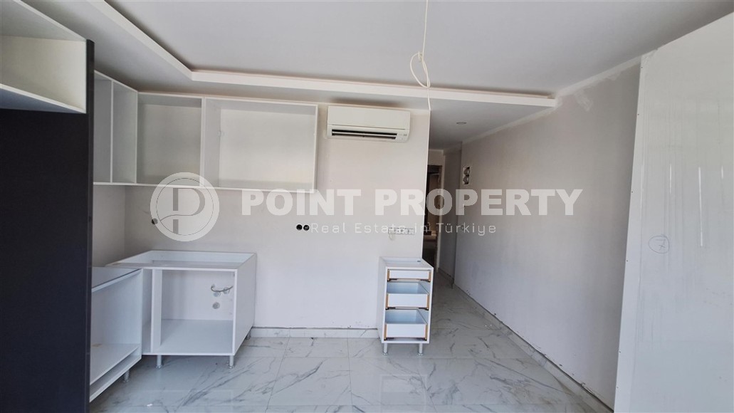 Двухкомнатные квартиры и квартиры-студии, 32-65м², в новом проекте с бассейном в центре Алании-id-2284-фото-6