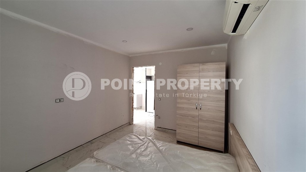 Двухкомнатные квартиры и квартиры-студии, 32-65м², в новом проекте с бассейном в центре Алании-id-2284-фото-12