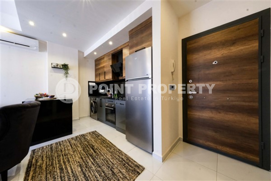 Стильная квартира 1+1, 55м², с видом на горы Торос в новом элитном комплексе в Махмутларе, Алания-id-1649-фото-8