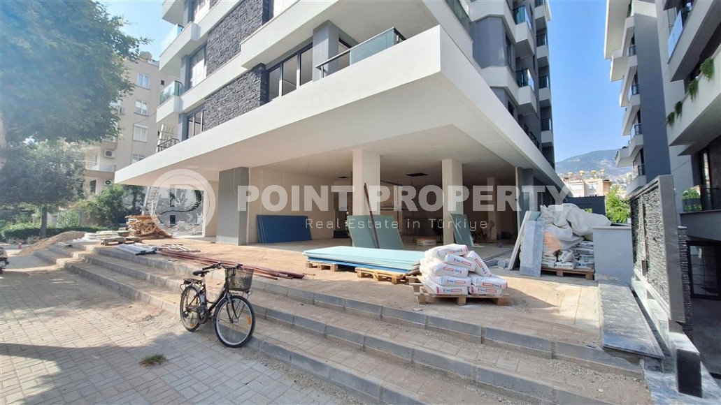 Двухкомнатные квартиры и квартиры-студии, 32-65м², в новом проекте с бассейном в центре Алании-id-2284-фото-15