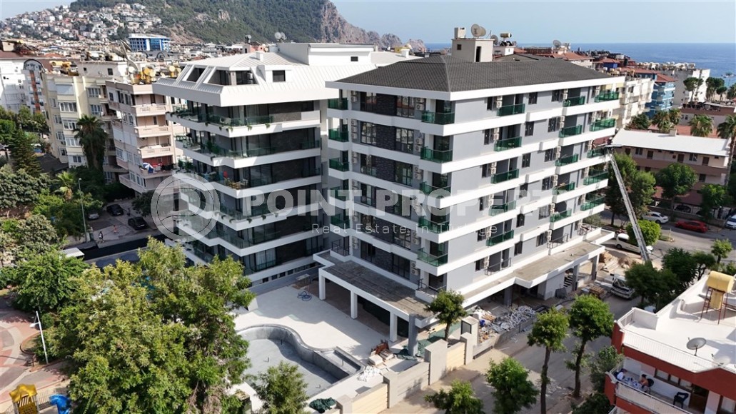 Двухкомнатные квартиры и квартиры-студии, 32-65м², в новом проекте с бассейном в центре Алании-id-2284-фото-16