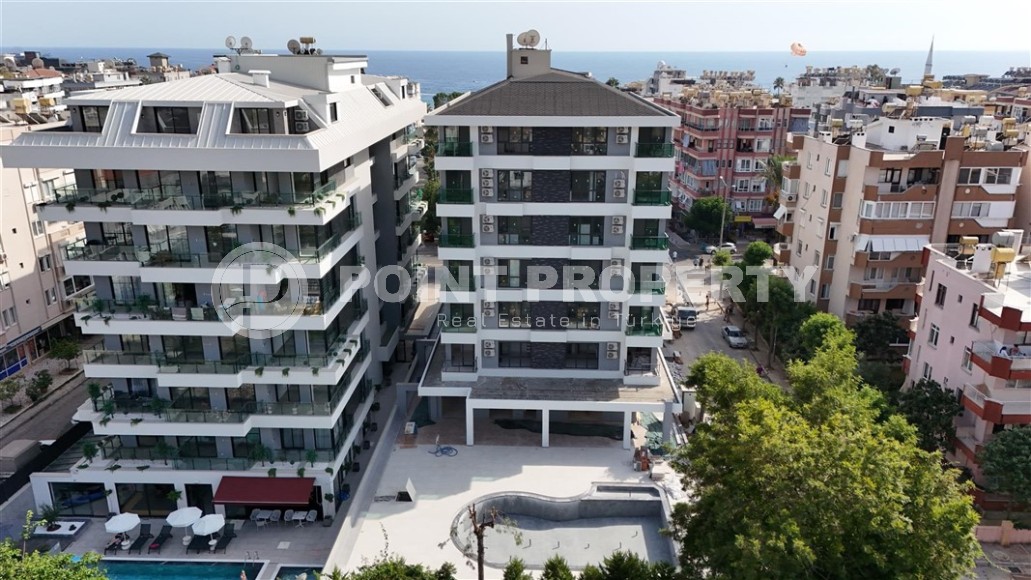 Двухкомнатные квартиры и квартиры-студии, 32-65м², в новом проекте с бассейном в центре Алании-id-2284-фото-17