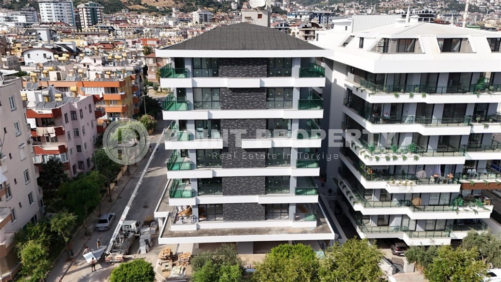 Двухкомнатные квартиры и квартиры-студии, 32-65м², в новом проекте с бассейном в центре Алании-id-2284-фото-18