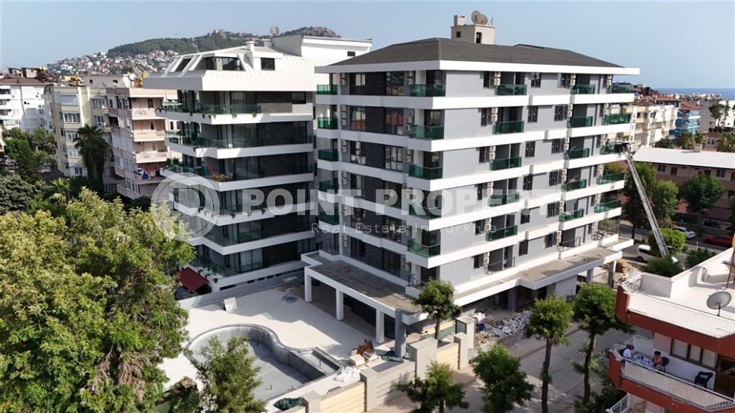 Двухкомнатные квартиры и квартиры-студии, 32-65м², в новом проекте с бассейном в центре Алании-id-2284-фото-19