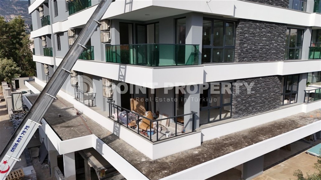 Двухкомнатные квартиры и квартиры-студии, 32-65м², в новом проекте с бассейном в центре Алании-id-2284-фото-24