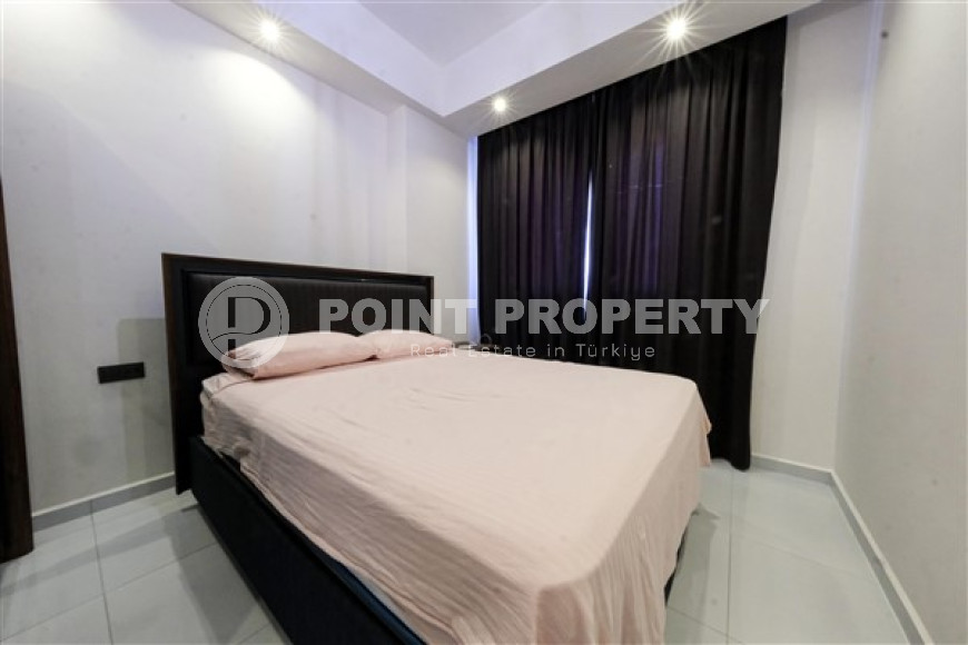 Стильная квартира 1+1, 55м², с видом на горы Торос в новом элитном комплексе в Махмутларе, Алания-id-1649-фото-10