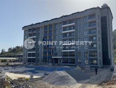 Spacious one-bedroom apartment in a new complex in Gazipasa-id-8253-photo-1