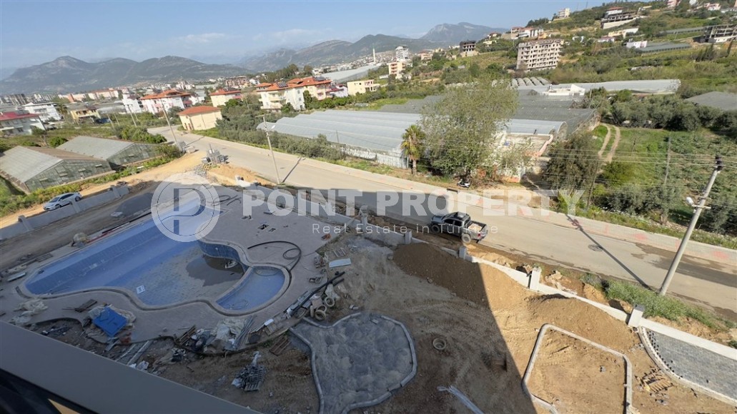 Spacious one-bedroom apartment in a new complex in Gazipasa-id-8253-photo-11