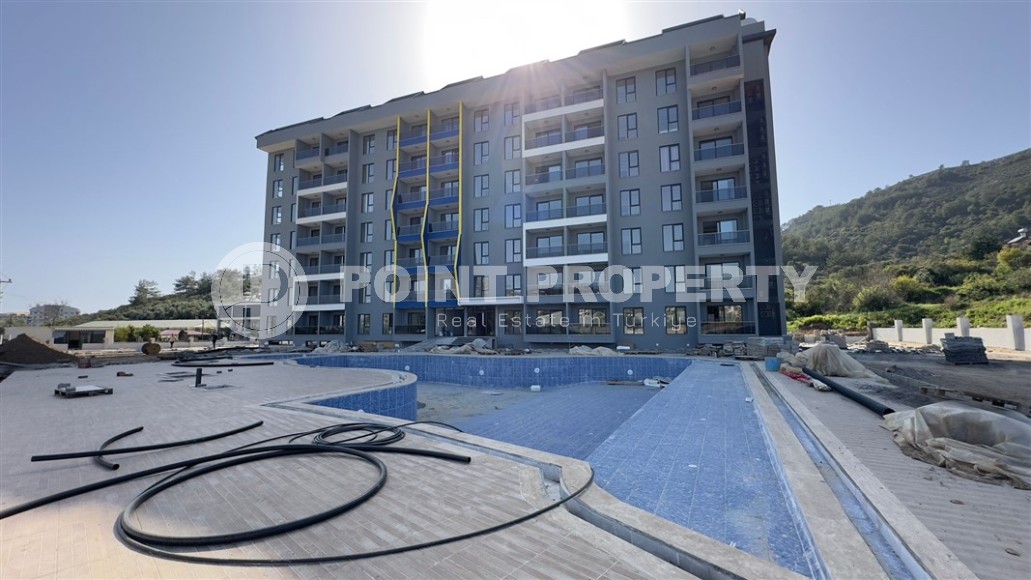 Spacious one-bedroom apartment in a new complex in Gazipasa-id-8253-photo-14