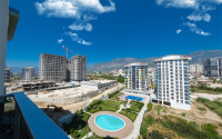 Стильная квартира 1+1, 55м², с видом на горы Торос в новом элитном комплексе в Махмутларе, Алания-id-1649-фото-13