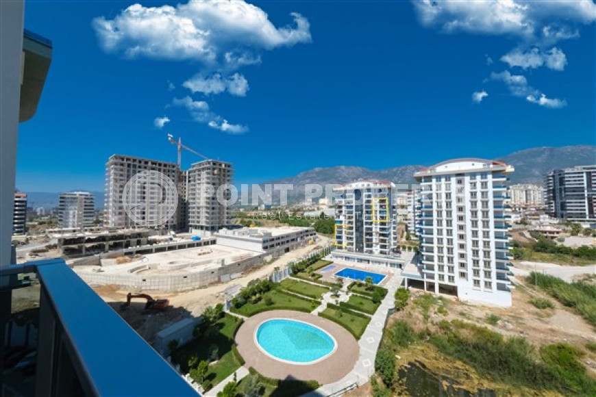 Стильная квартира 1+1, 55м², с видом на горы Торос в новом элитном комплексе в Махмутларе, Алания-id-1649-фото-13