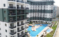 Стильная квартира 1+1, 55м², с видом на горы Торос в новом элитном комплексе в Махмутларе, Алания-id-1649-фото-15