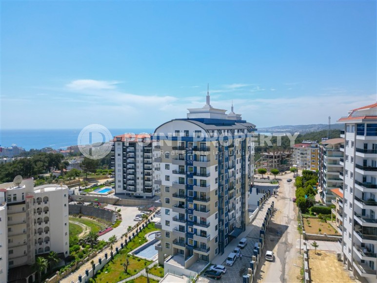 Apartments from the owner in a complex under construction in the Avsallar area, a large area of the complex and sea views-id-1467-photo-22