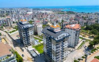 Apartments from the owner in a complex under construction in the Avsallar area, a large area of the complex and sea views-id-1467-photo-23