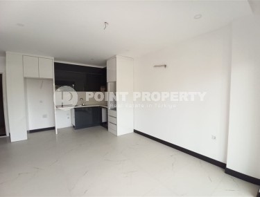 Квартира с одной спальней,50м², в комплексе премиум класса в 500м от моря в районе Кестель, Алания-id-1625-фото-2