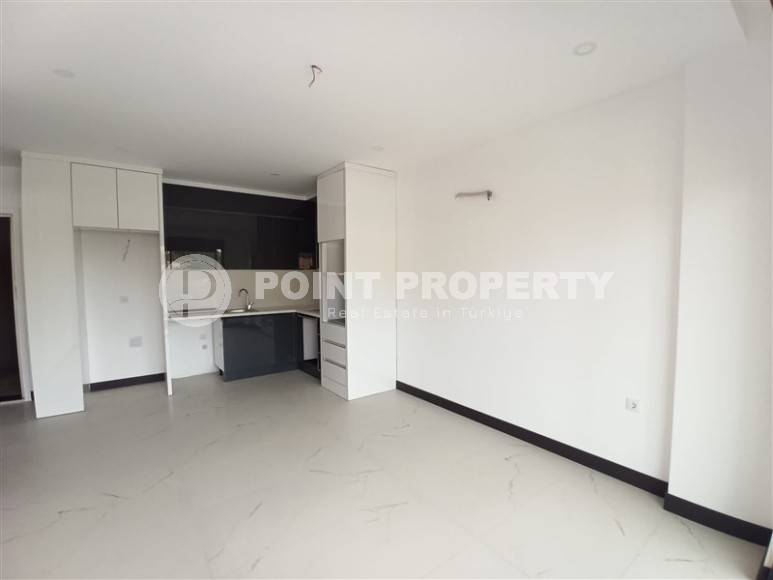 Квартира с одной спальней,50м², в комплексе премиум класса в 500м от моря в районе Кестель, Алания-id-1625-фото-2