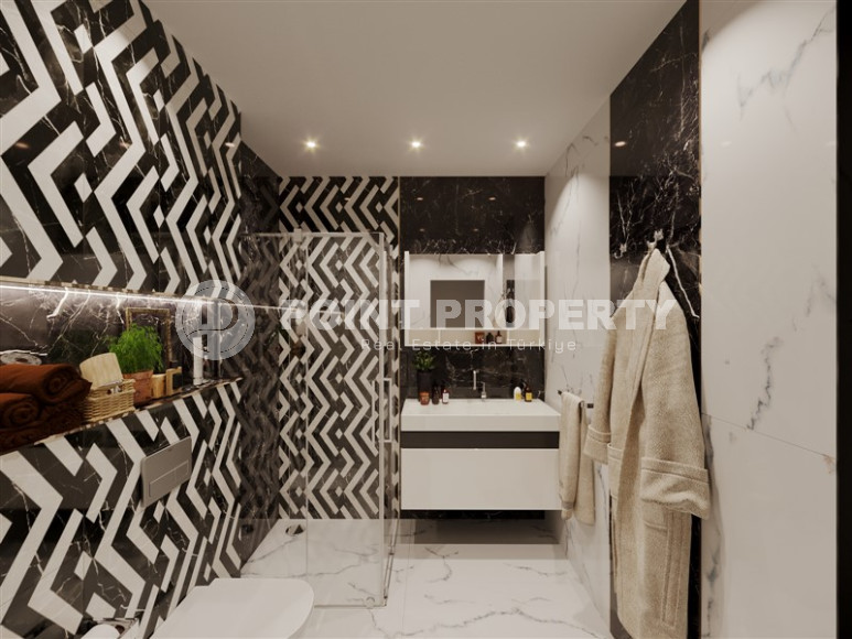 Квартиры на продажу в жилом комплексе на этапе строительства в районе Махмутлар, в 2500 метрах от моря. Беспроцентная рассрочка. 47- 100 м2.-id-1092-фото-6