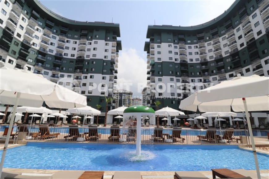 Стильная квартира 1+1, 55м², с видом на горы Торос в новом элитном комплексе в Махмутларе, Алания-id-1649-фото-25