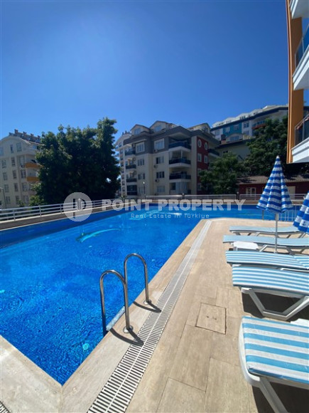 Меблированная двухкомнатная квартира, 85м², в 800м от моря в районе Алании Тосмур-id-1650-фото-9