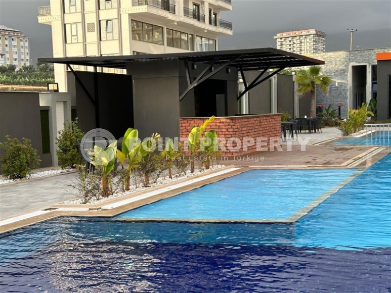 Современная квартира в закрытом новом комплексе в Махмутлар!-id-8274-фото-21