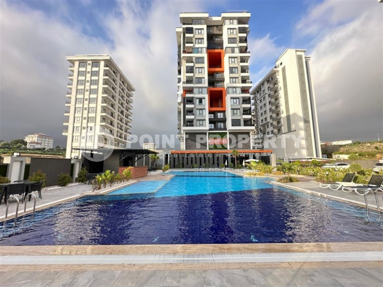 Современная квартира в закрытом новом комплексе в Махмутлар!-id-8274-фото-24